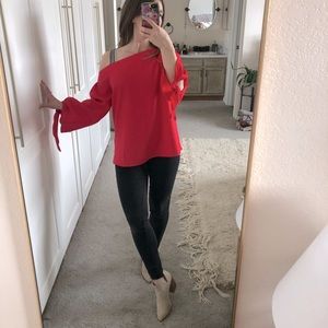 Red top, size small, very pretty slanted neckline